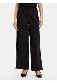 Liu Jo Sport Joggery TA5074 T2900 Czarny Relaxed Fit. Kolor: czarny. Materiał: syntetyk. Styl: sportowy