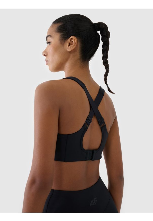 4f - 4F Biustonosz treningowy ze średnim wsparciem - czarny M. Kolor: czarny. Materiał: dzianina, materiał, syntetyk, włókno, jersey, guma, elastan, tkanina. Wzór: gładki, ze splotem. Sport: bieganie, kolarstwo, fitness