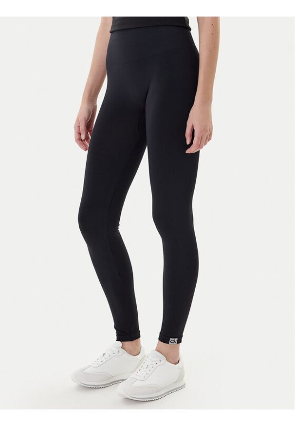 Calvin Klein Legginsy 701233681 Czarny Slim Fit. Kolor: czarny. Materiał: syntetyk