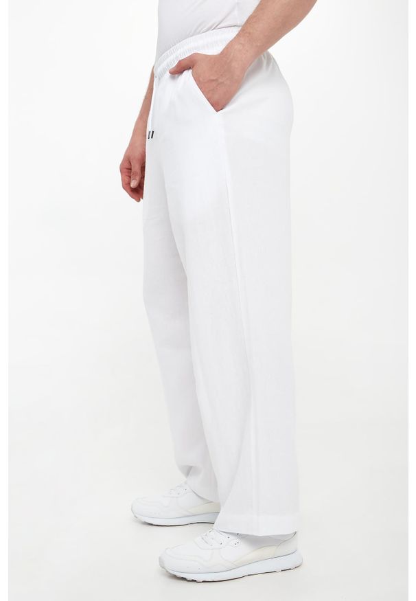 Emporio Armani Swimwear - Spodnie męskie z lnem EMPORIO ARMANI SWIMWEAR. Materiał: len