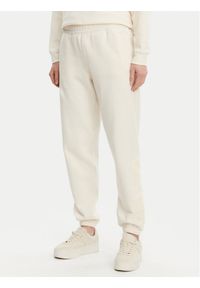 DKNY Sport Spodnie dresowe DP5P3585 Beżowy Regular Fit. Kolor: beżowy. Materiał: bawełna, syntetyk #1