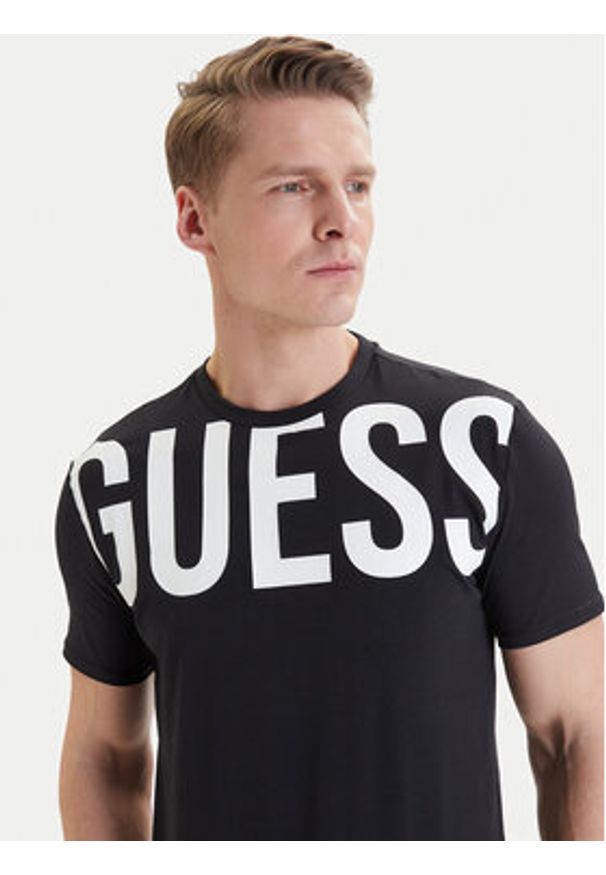 Guess T-Shirt F6GI01 J1314 Czarny Slim Fit. Kolor: czarny. Materiał: bawełna