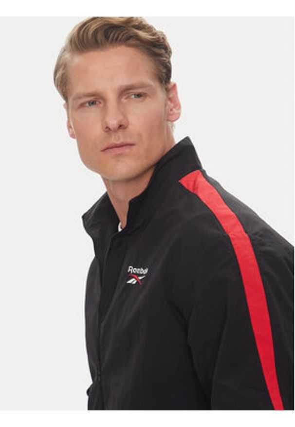 Reebok Kurtka przejściowa 100215495 Czarny Regular Fit. Kolor: czarny. Materiał: syntetyk