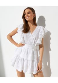 LOVE SHACK FANCY - Bawełniana sukienka Gwen. Kolor: biały. Materiał: bawełna. Wzór: aplikacja, koronka. Typ sukienki: rozkloszowane