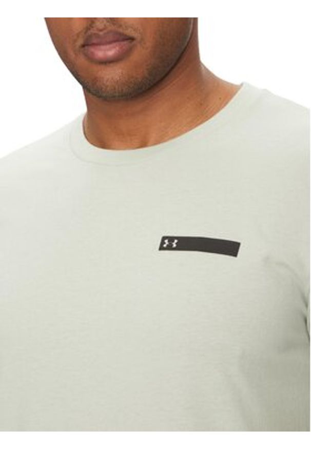 Under Armour T-Shirt Strip Logo 1390203 Écru Relaxed Fit. Materiał: syntetyk