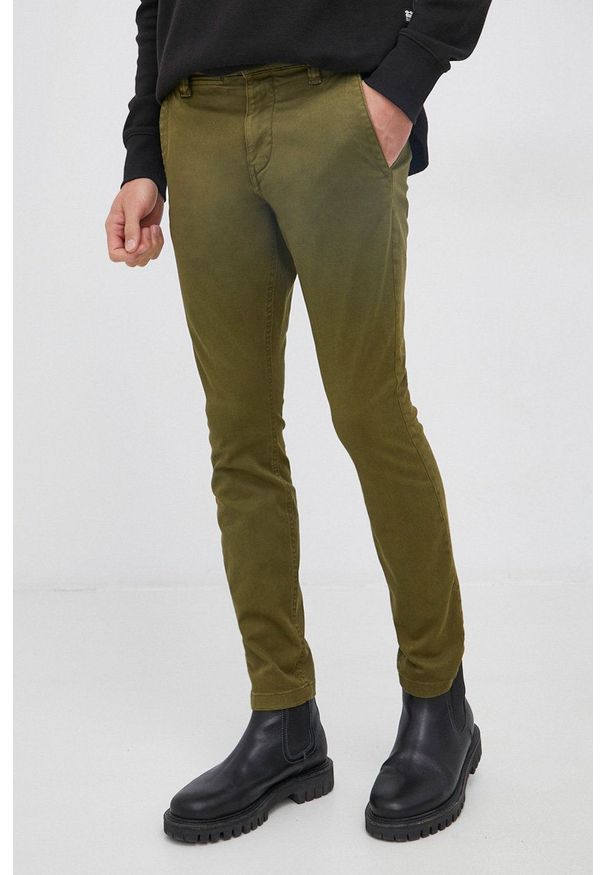 G-Star RAW - G-Star Raw - Spodnie. Kolor: zielony. Materiał: poliester, bawełna, tkanina. Wzór: gładki