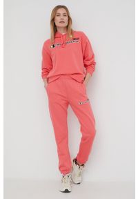 Champion spodnie dresowe CHAMPION X SMILEY 115934 damskie kolor różowy z aplikacją. Stan: podwyższony. Kolor: różowy. Materiał: dresówka. Wzór: aplikacja