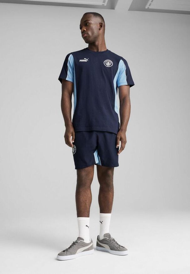Puma - Męska koszulka Manchester City ftblARCHIVE PUMA Navy Team Light Blue. Kolor: niebieski. Materiał: guma. Wzór: nadruk