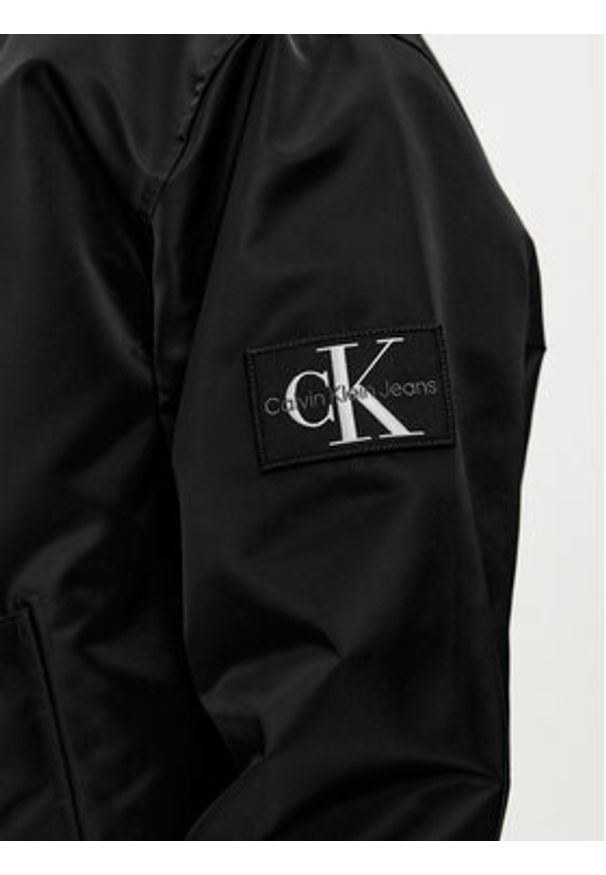 Calvin Klein Jeans Kurtka bomber J30J325110 Czarny Relaxed Fit. Kolor: czarny. Materiał: syntetyk