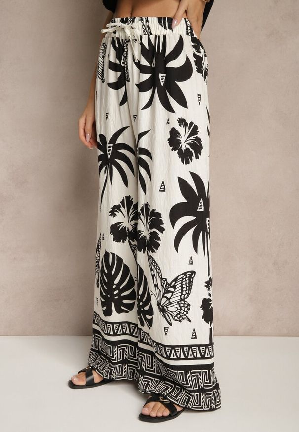 Renee - Czarno-Beżowe Szerokie Spodnie z Gumką w Pasie w Stylu Boho Evirami. Kolor: czarny. Sezon: lato. Styl: boho