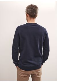 Ochnik - Granatowa bluza męska z logo. Kolor: niebieski. Materiał: bawełna. Długość rękawa: długi rękaw. Długość: długie. Wzór: nadruk