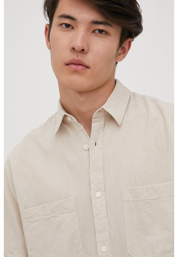 Jack & Jones koszula z domieszką lnu męska kolor beżowy relaxed z kołnierzykiem klasycznym. Typ kołnierza: kołnierzyk klasyczny. Kolor: beżowy. Materiał: len. Długość rękawa: krótki rękaw. Długość: krótkie. Styl: klasyczny
