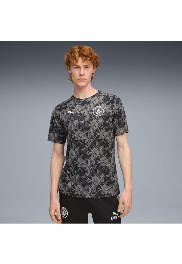 Puma - Koszulka rozgrzewkowa Manchester City 2025/26. Kolor: czarny. Sport: piłka nożna