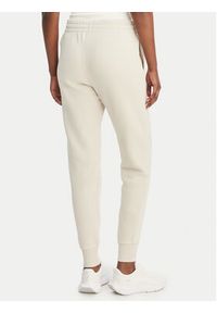 Under Armour Spodnie dresowe UA Icon Fleece 6001537 Beżowy Slim Fit. Kolor: beżowy. Materiał: bawełna #5