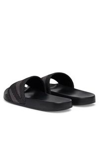 Tommy Jeans Klapki EM0EM01697 Czarny. Kolor: czarny. Materiał: materiał #3