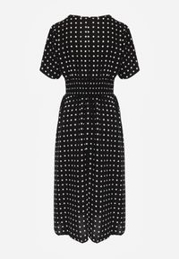 Renee - Czarna Bawełniana Sukienka o Rozkloszowanym Fasonie w Kropki Tolimirae. Okazja: na co dzień. Kolor: czarny. Materiał: bawełna. Długość rękawa: krótki rękaw. Wzór: kropki. Sezon: lato. Typ sukienki: rozkloszowane. Styl: casual #8