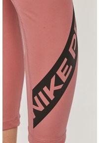 Nike - Legginsy. Kolor: różowy. Materiał: tkanina, skóra, dzianina, włókno. Technologia: Dri-Fit (Nike). Wzór: nadruk #3