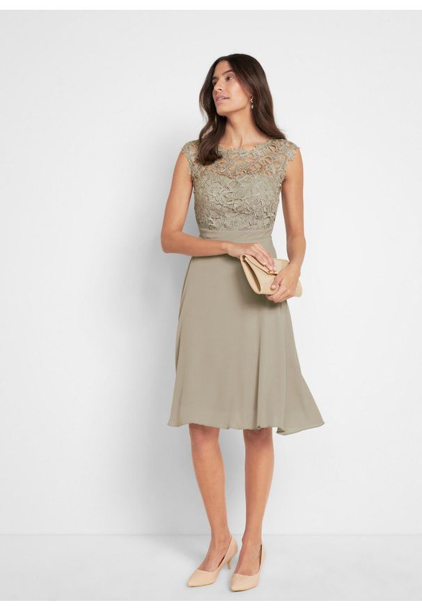 bonprix - Sukienka koronką. Kolor: zielony. Materiał: koronka. Wzór: koronka. Styl: elegancki. Długość: mini