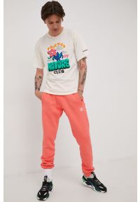 adidas Originals spodnie dresowe HG3903 męskie kolor pomarańczowy gładkie. Kolor: pomarańczowy. Materiał: dresówka. Wzór: gładki #2