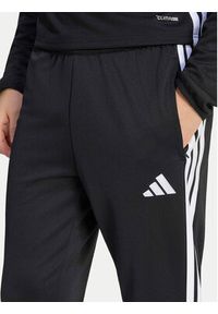 Adidas - adidas Spodnie dresowe Tiro 25 Essentials Training KG0809 Czarny Regular Fit. Kolor: czarny. Materiał: syntetyk #5