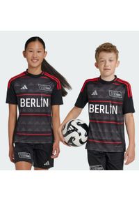 Adidas - Koszulka 1. FC Union Berlin 24/25 Away Kids. Kolor: czerwony, czarny, różowy, wielokolorowy. Materiał: materiał #1