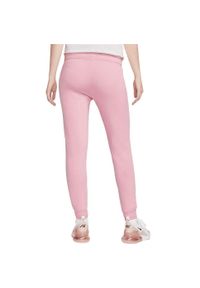 Nike - Spodnie Mid-Rise Slim Rozmiar M Różowy - DQ5174-690. Kolor: różowy. Materiał: materiał. Sport: fitness