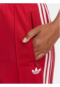 Adidas - adidas Spodnie dresowe Firebird Loose Tracksuit KS4670 Czerwony Loose Fit. Kolor: czerwony. Materiał: syntetyk #5