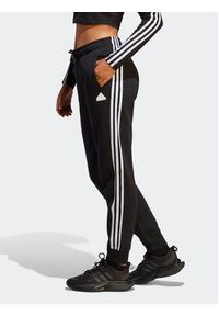 Adidas - adidas Spodnie dresowe Future Icons 3-Stripes Regular Tracksuit Bottoms HT4704 Czarny Regular Fit. Kolor: czarny. Materiał: bawełna #3