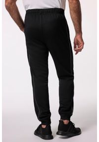 JAY-PI - Męskie Spodnie dresowe fitness technologiczna dzianina QuickDry do 7 XL. Kolekcja: plus size. Kolor: czarny. Materiał: materiał, poliester. Długość: długie. Sport: fitness