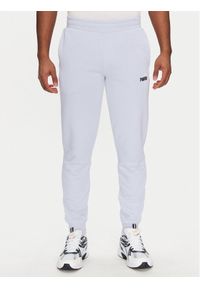 Puma Spodnie dresowe Ess 684714 Fioletowy Regular Fit. Kolor: fioletowy. Materiał: bawełna