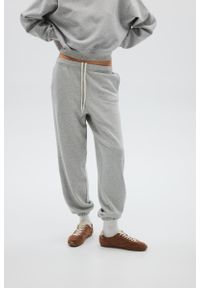 Marsala - Spodnie typu jogger w kolorze LIGHT GREY MELANGE - COOL-M. Stan: podwyższony. Materiał: guma, dzianina, poliester, dresówka, bawełna. Wzór: melanż. Styl: elegancki