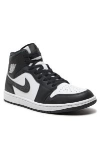Nike Air Jordan 1 Mid SE Sneakersy męskie. Okazja: na co dzień. Kolor: czarny. Materiał: guma, syntetyk, materiał, skóra. Szerokość cholewki: normalna. Model: Nike Air Jordan #3