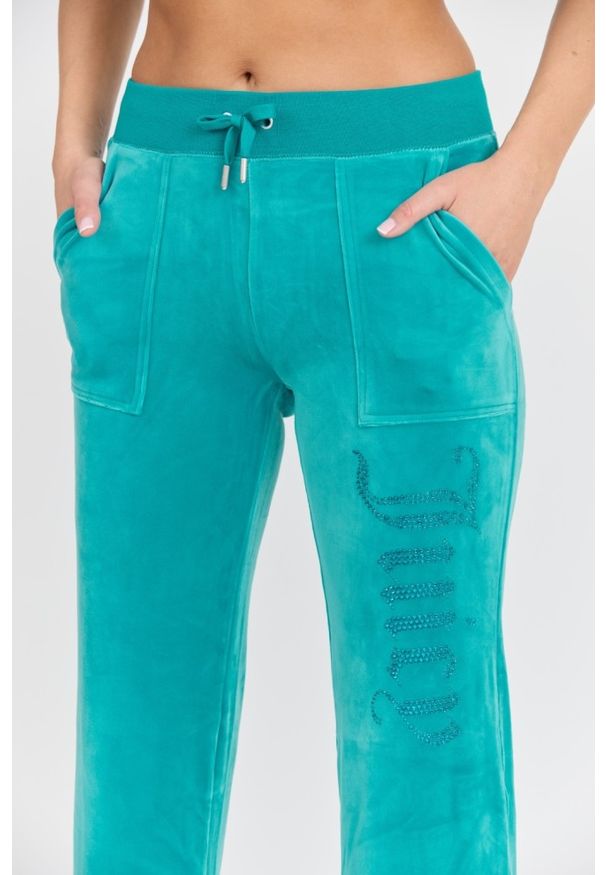 Juicy Couture - JUICY COUTURE Damskie turkusowe spodnie desowe Layla Jewelled Low Rise Pant, Rozmiar S. Kolor: niebieski. Materiał: poliester, materiał, elastan