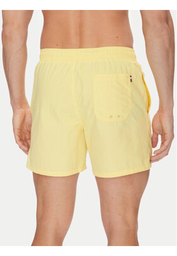 TOMMY HILFIGER - Tommy Hilfiger Szorty kąpielowe UM0UM03477 Żółty Regular Fit. Kolor: żółty. Materiał: syntetyk