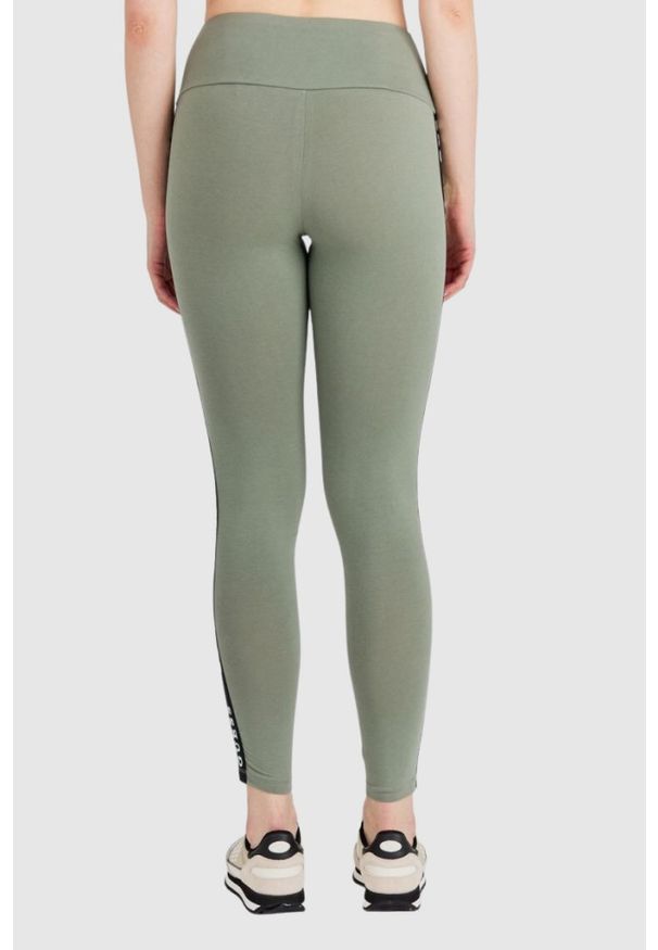 Guess - GUESS Zielone legginsy damskie z lampasami. Kolor: zielony. Materiał: bawełna