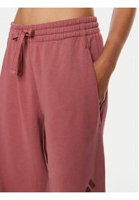 Adidas - adidas Spodnie dresowe ALL SZN French Terry IY6815 Różowy Loose Fit. Kolor: różowy. Materiał: bawełna