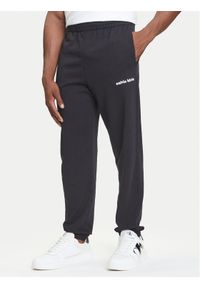 Calvin Klein Jeans Spodnie dresowe LV04RC294G Czarny Regular Fit. Kolor: czarny. Materiał: bawełna #1