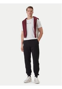 TOMMY HILFIGER - Tommy Hilfiger Spodnie dresowe Global Stripe MW0MW42882 Czarny Regular Fit. Kolor: czarny. Materiał: bawełna #4