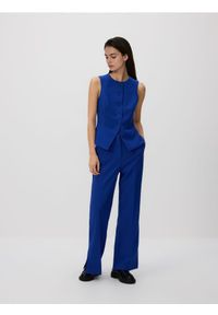 Reserved - Spodnie z rozcięciami - niebieski. Kolor: niebieski. Materiał: tkanina, wiskoza #1