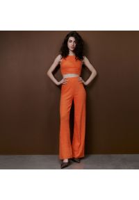 Reserved - Spodnie z wiskozą - Pomarańczowy. Kolor: pomarańczowy. Materiał: wiskoza