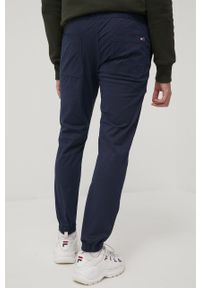 Tommy Jeans spodnie SCANTON DM0DM12755.PPYY męskie kolor granatowy joggery. Kolor: niebieski. Materiał: tkanina, bawełna, materiał. Wzór: gładki #3