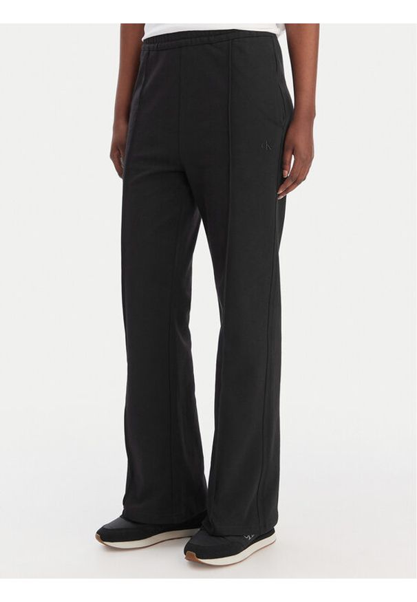 Calvin Klein Jeans Spodnie dresowe Archive Logo LV047B240G Czarny Regular Fit. Kolor: czarny. Materiał: bawełna