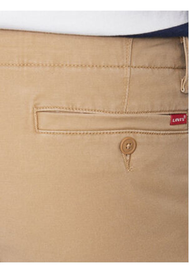 Levi's® Spodnie materiałowe 39441-0000 Beżowy Taper Fit. Kolor: beżowy. Materiał: bawełna