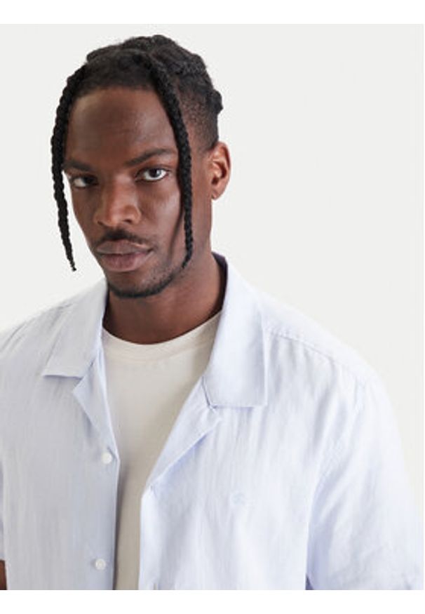 Calvin Klein Koszula LV04LF137G Fioletowy Relaxed Fit. Kolor: fioletowy. Materiał: syntetyk