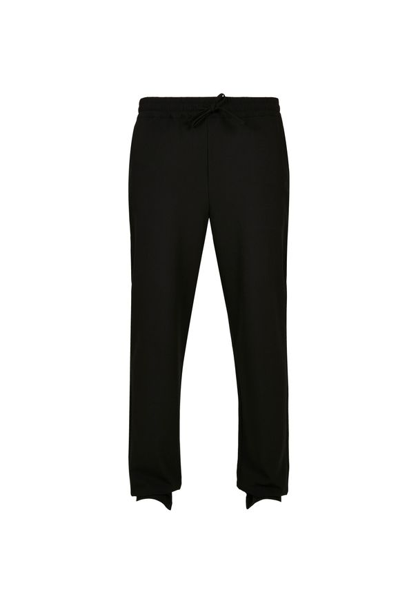 Spodnie joggingowe Urban Classics zwężane. Kolor: czarny. Materiał: dresówka