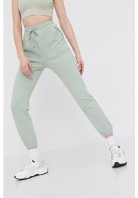 Answear Lab Spodnie damskie kolor zielony gładkie. Kolor: turkusowy. Materiał: dzianina. Wzór: gładki