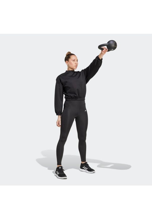 Adidas - Bluza fitness damska ADIDAS crop top. Kolor: czarny. Materiał: materiał. Sport: fitness