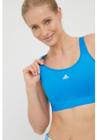 adidas Performance biustonosz sportowy TLRD Move HC7859 kolor turkusowy gładki. Kolor: turkusowy. Materiał: skóra, dzianina, materiał. Wzór: gładki. Sport: fitness, bieganie #1