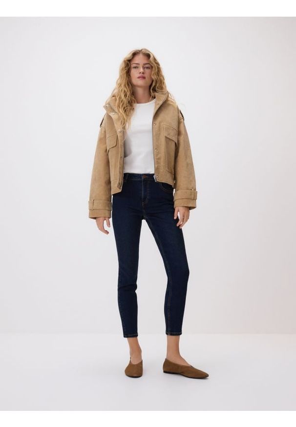 Reserved - Jeansy slim - granatowy. Kolor: niebieski