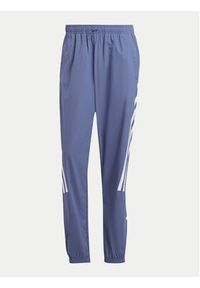 Adidas - adidas Spodnie dresowe Future Icons 3-Stripes IR9239 Niebieski Slim Fit. Kolor: niebieski. Materiał: syntetyk #3